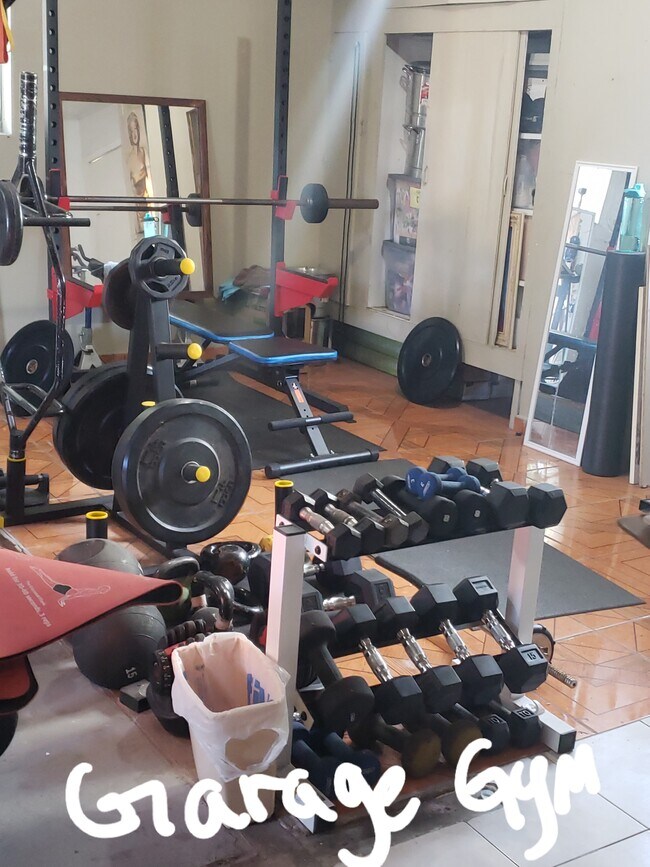 Garage gym accessible to all tenants (more items included not seen on pic) - 6230 Newell St