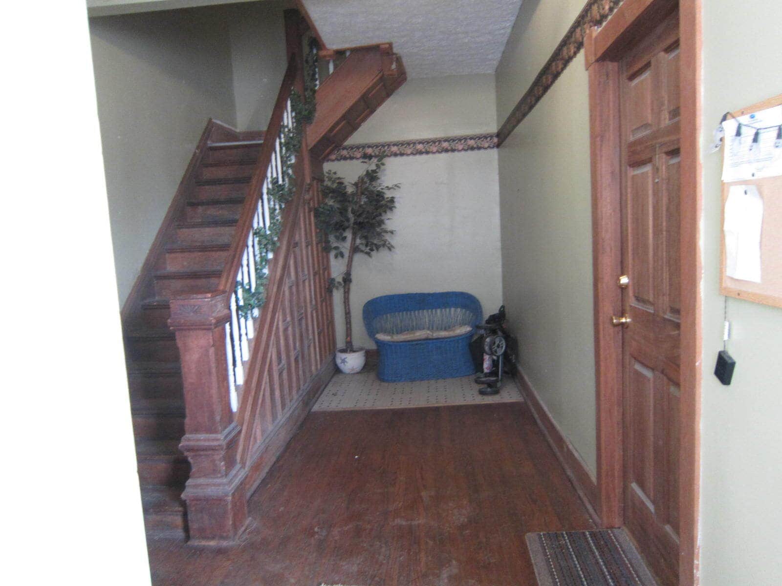 shared entry room behind a combination lock front door - 1728 I St