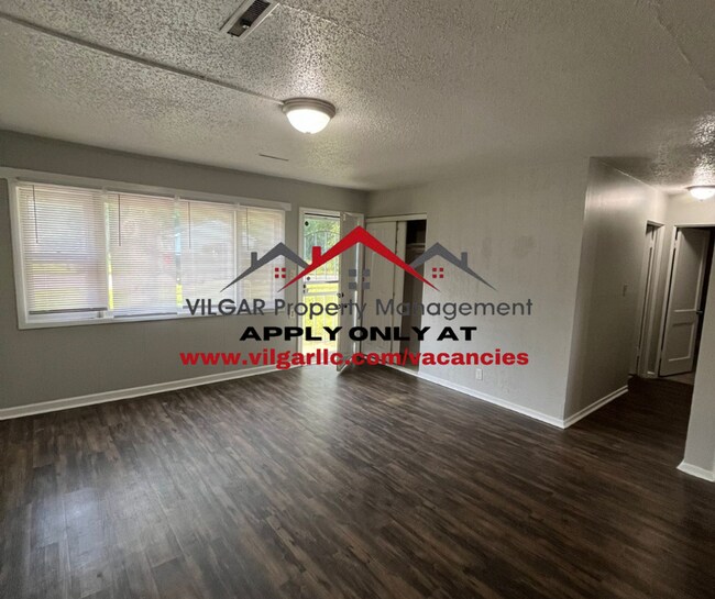 Building Photo - Step into comfort and security in this bea...