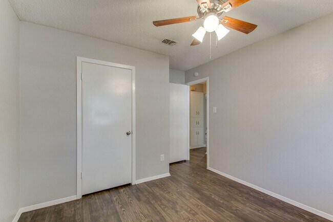 Building Photo - No Carpet! Great tree shaded yard!