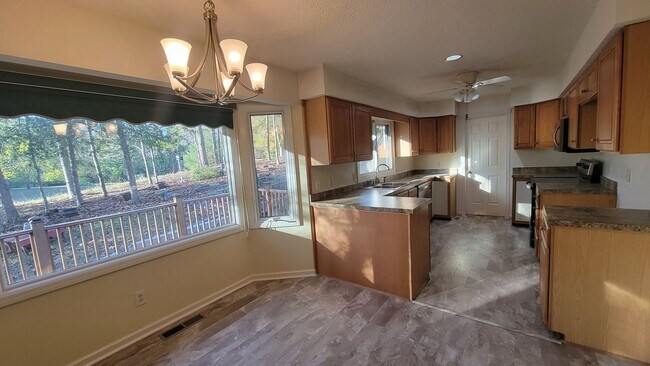 Building Photo - Exclusively Offered by Muse Realty Rentals...