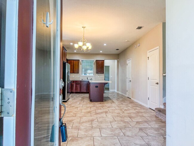Building Photo - Spacious 4-Bedroom Townhome in Harmony – A Perfect Blend of Nature & Comfort!