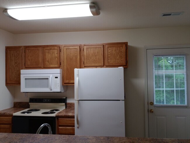 Building Photo - 5005-5007 Carrie Ridge Dr.