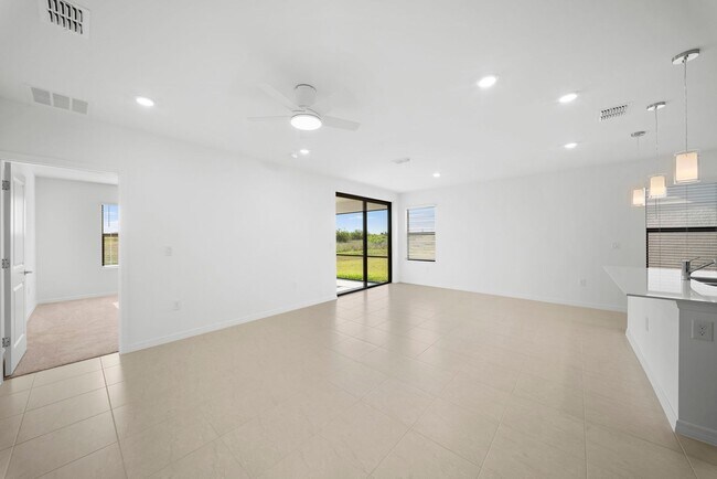 Building Photo - Newly constructed property offers four spacious bedrooms, two full bath in Lehigh Acres