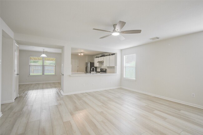 Building Photo - 8542 Village Rose Ln