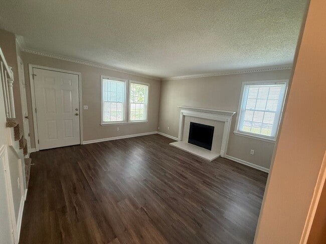 Building Photo - Beautiful 2BR Townhome | Huge Private Deck | Lawn Care Included | $1,695/mo