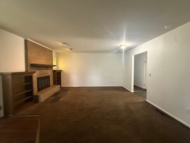 Building Photo - LOCATION! Check out this spacious 3 bedroom with 2.5 baths!