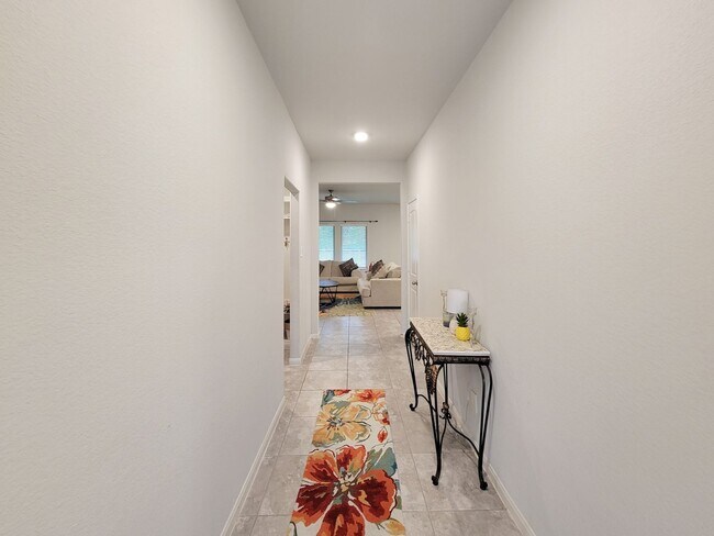 Building Photo - BEAUTIFUL 3 BEDROOM 2 BATH HOME WITH NO BACKYARD NEIGHBORS. TALL TREES AS YOU LOOK FROM THE COVER...