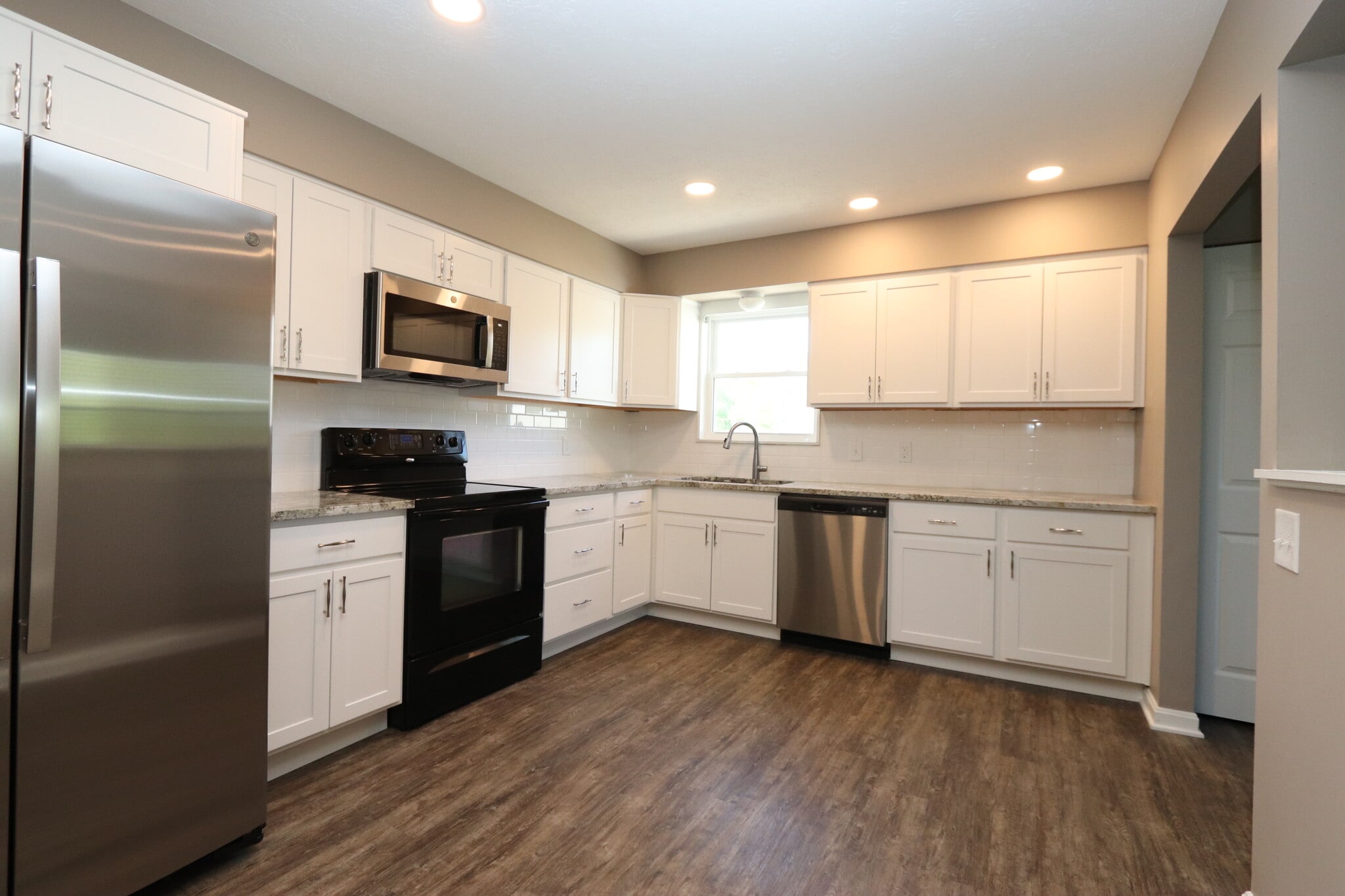 Building Photo - 6810 Village Green Blvd