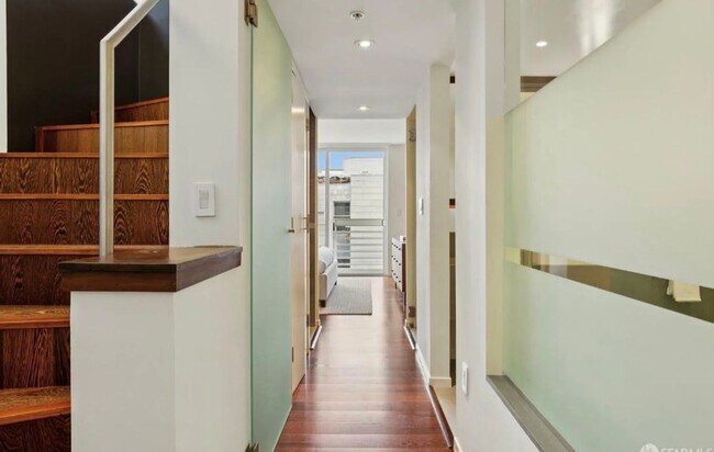 Building Photo - One-of-a-Kind Sophisticated Top-Floor Cond...