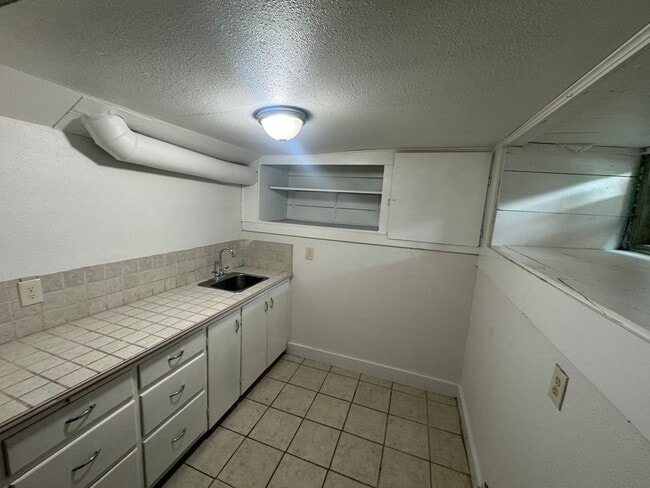 Building Photo - Non-Refundable & Security Deposit Total: $...