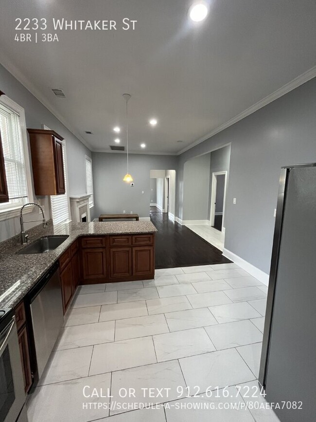 Building Photo - "Spacious 4-Bed, 3-Bath Duplex with Granit...