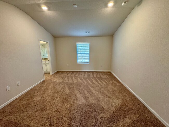 Building Photo - Located in Creedmore Hills a 4BR/2.5BA home with 2 car garage