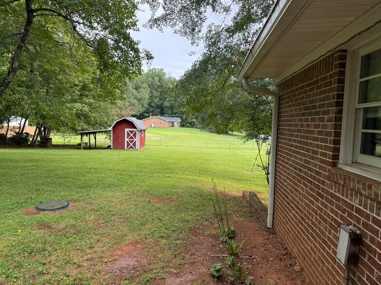 Back porch view - 403 Cane Creek Valley Rd