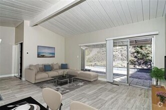 Building Photo - Mid-Century modern single-story home. Fea...