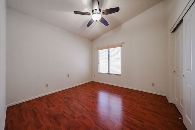 Building Photo - Welcome to this stunning 4-bedroom, 2-bath...