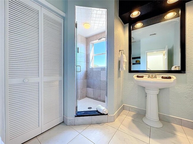 Building Photo - 8485 Blind Pass Dr