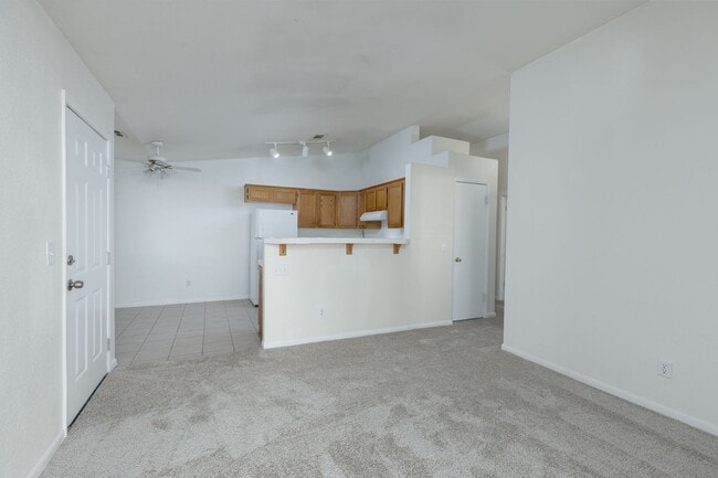 Building Photo - Refurbished upstairs two bedroom in well maintained East side gated complex