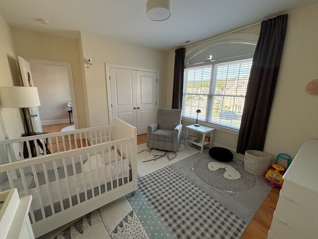 Main floor, bedroom with full bath attached and a closet. Hardwood floors. - 140 Wells View Rd