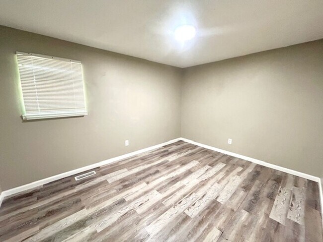 Building Photo - Spacious 4-Bedroom, 2-Bath Home Located in...