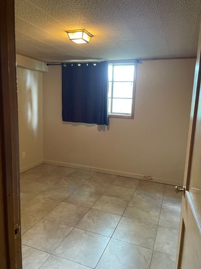 Building Photo - Spacious 4-Bedroom Ranch in District 66 with Walkout Basement & Mother-in-Law Suite