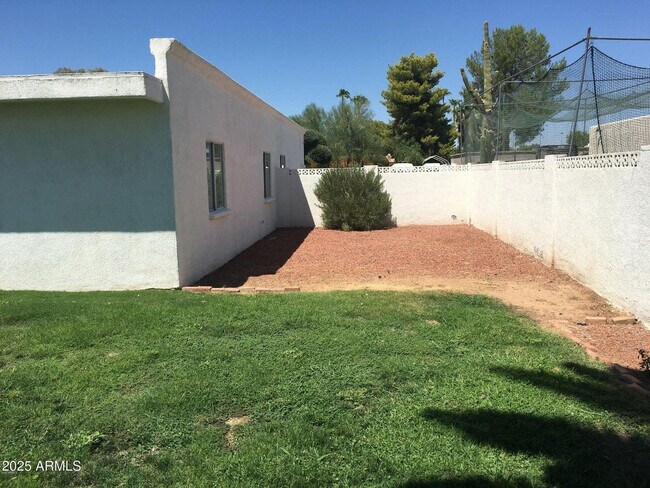 Building Photo - 5623 E Aster Dr