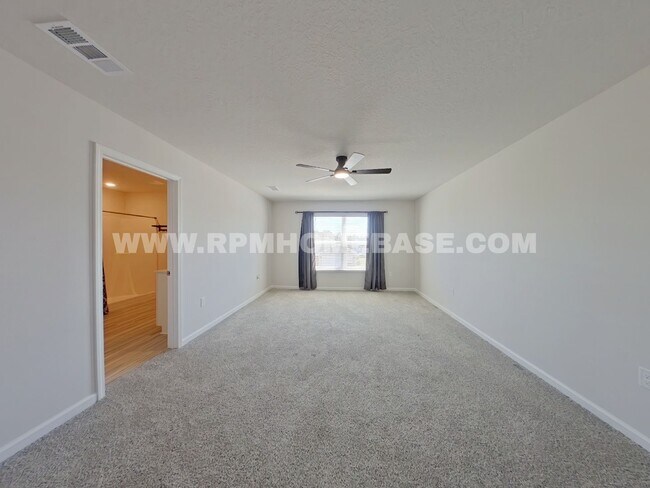 Building Photo - Spacious 5-Bedroom Home in Shoal River Community with Modern Features and Community Pool Access!