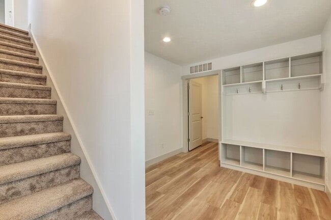 Building Photo - Modern End Unit townhouse w attached 2 car...
