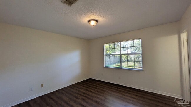 Building Photo - 6942 Falcon Dr