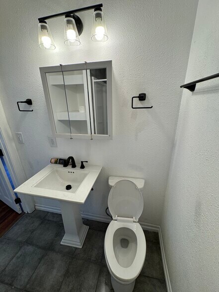 Pedestal sink and toilet - 526 Brooks Ave