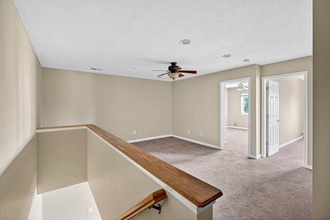 Building Photo - Charming Fishers Condo – Move-In Ready