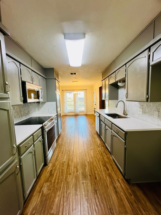 Building Photo - Coming Soon! Fireplace - Storage - Large backyard