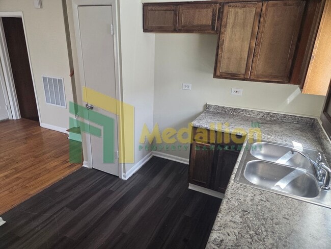 Building Photo - Updated 4-Bedroom Home with Finished Basement and Fenced Yard