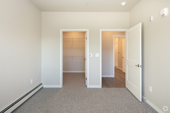 2BR, 1BA - 700SF Primary Bedroom - Prairie Ridge Senior Apartments