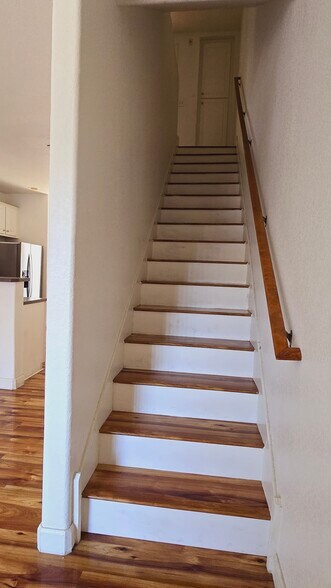 Stairs to Bedrooms - 4465 E Paradise Village Pkwy S APT 1129