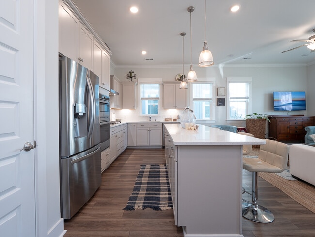 open plan kitchen overlooks family room - 3498 Habenaria Rd