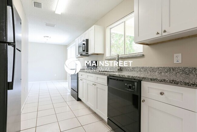Building Photo - 3 Bedroom Pet-Friendly Home in PORT CHARLOTTE, FL with Main Street Renewal