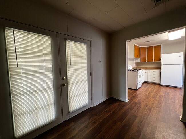 Building Photo - 3 Bedroom, 1.5 Bathroom, Brick Home with yard and Storage Building, Covered Porch