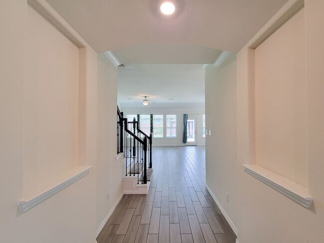 Building Photo - This thoughtfully designed home boasts 4 spacious bedrooms (2 down) and 3.5 baths, providing ampl...