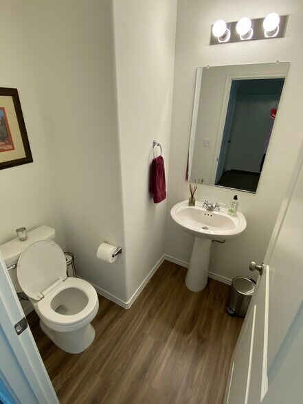 Downstairs half bath - 15208 Spruce Frost Cv
