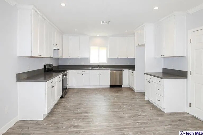 Building Photo - 7435 Collett Ave