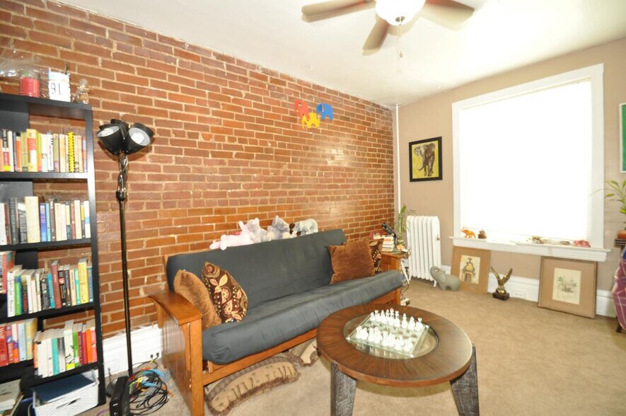 Exposed brick wall - bright - 1863 N Clarkson St