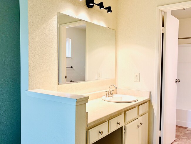 Building Photo - House like 2bed/1.5 Bath Condo with Spacious Corner Yard and 2 Car Garage