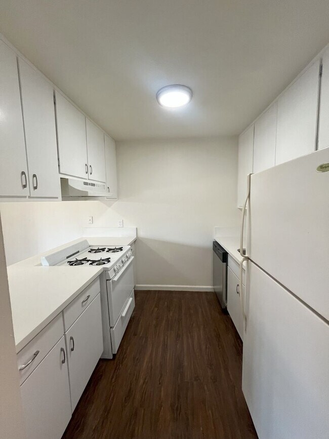 Building Photo - Upstairs unit Available Soon!