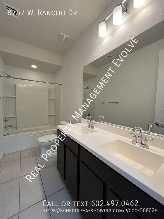 Building Photo - 8757 W Rancho Dr