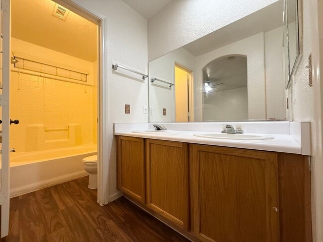 Building Photo - $500 OFF 1ST MONTHS RENT Updated 3-Bedroom Townhome in Gated Community with Pool Access