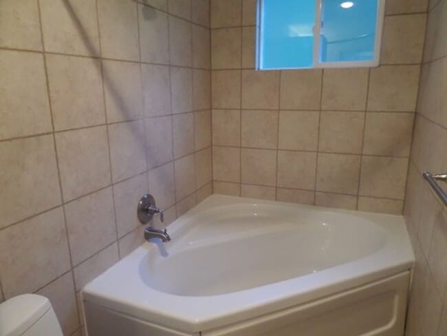 Building Photo - GREAT NEW PRICE! Gorgeous 6-Bedroom Home o...