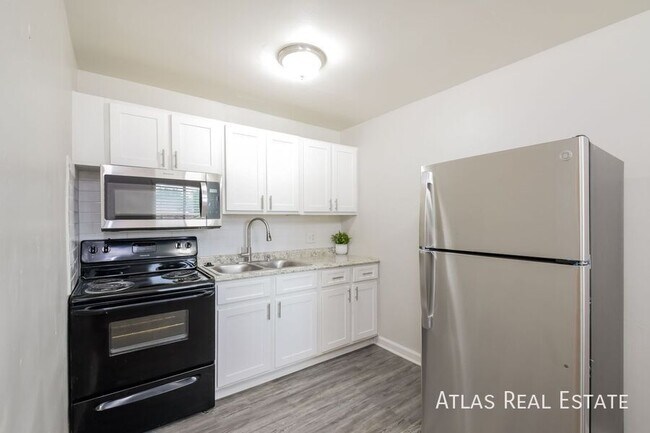 Building Photo - 9955 W 59th Pl