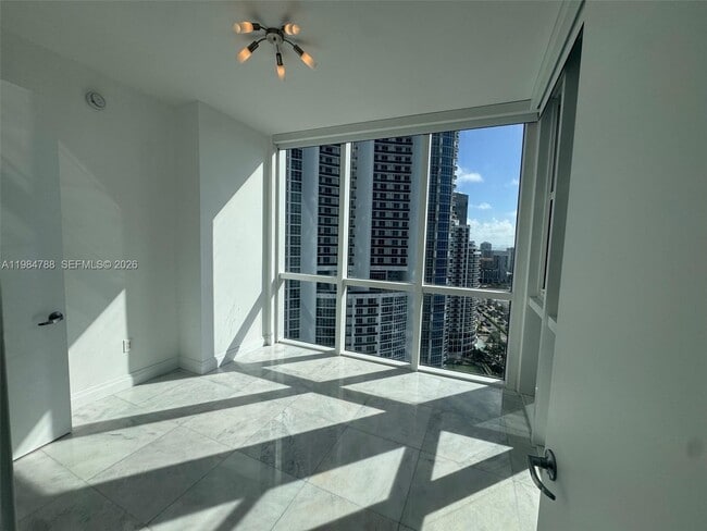 Building Photo - 18201 Collins Ave