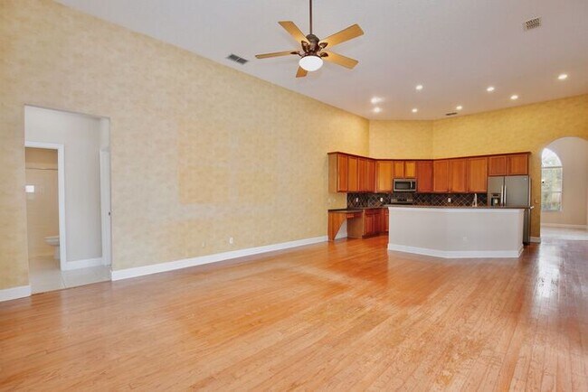 Building Photo - Stunning 4/3 Pool Home with a Bonus Room a...